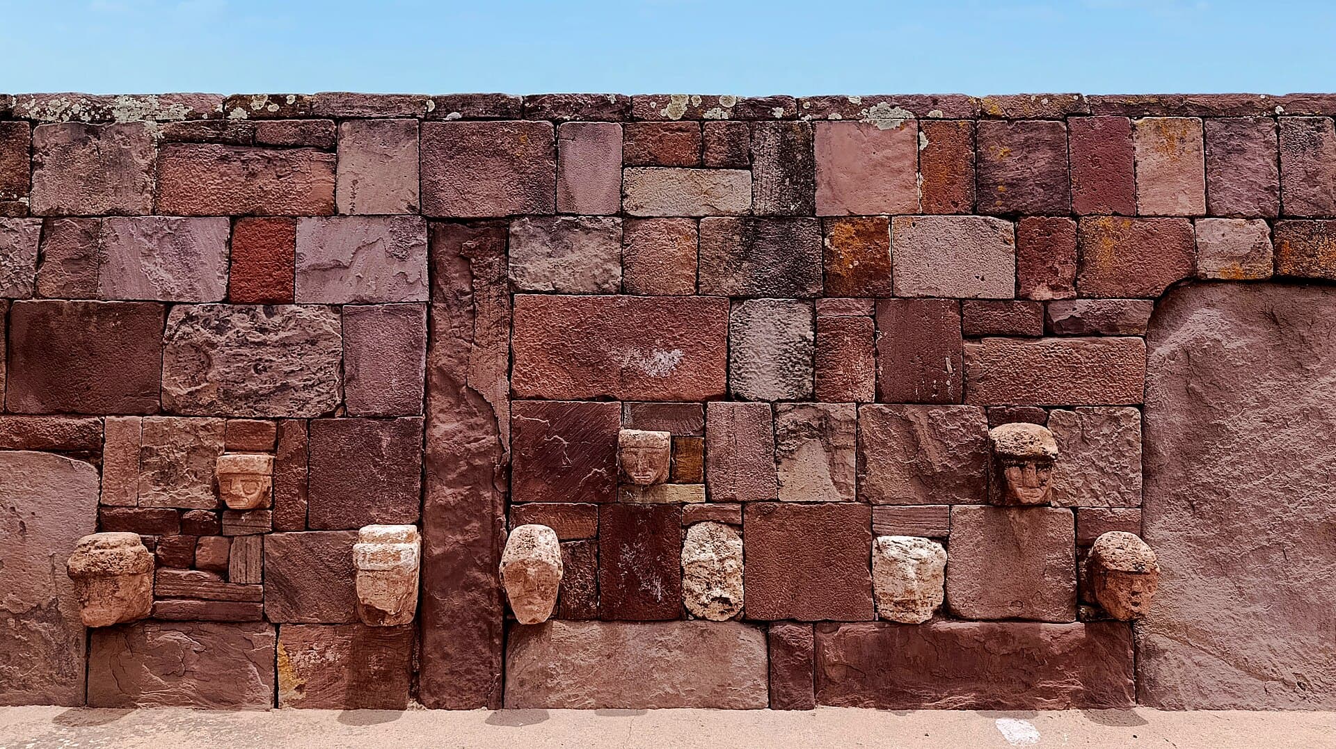 Faces set into the wall of the semi-subterranean temple