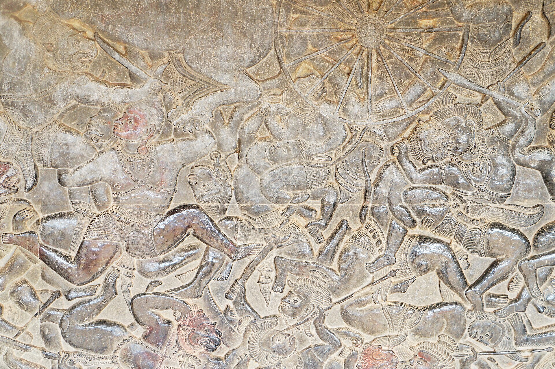 Bas-reliefs filling the gallery walls — myth carved into stone