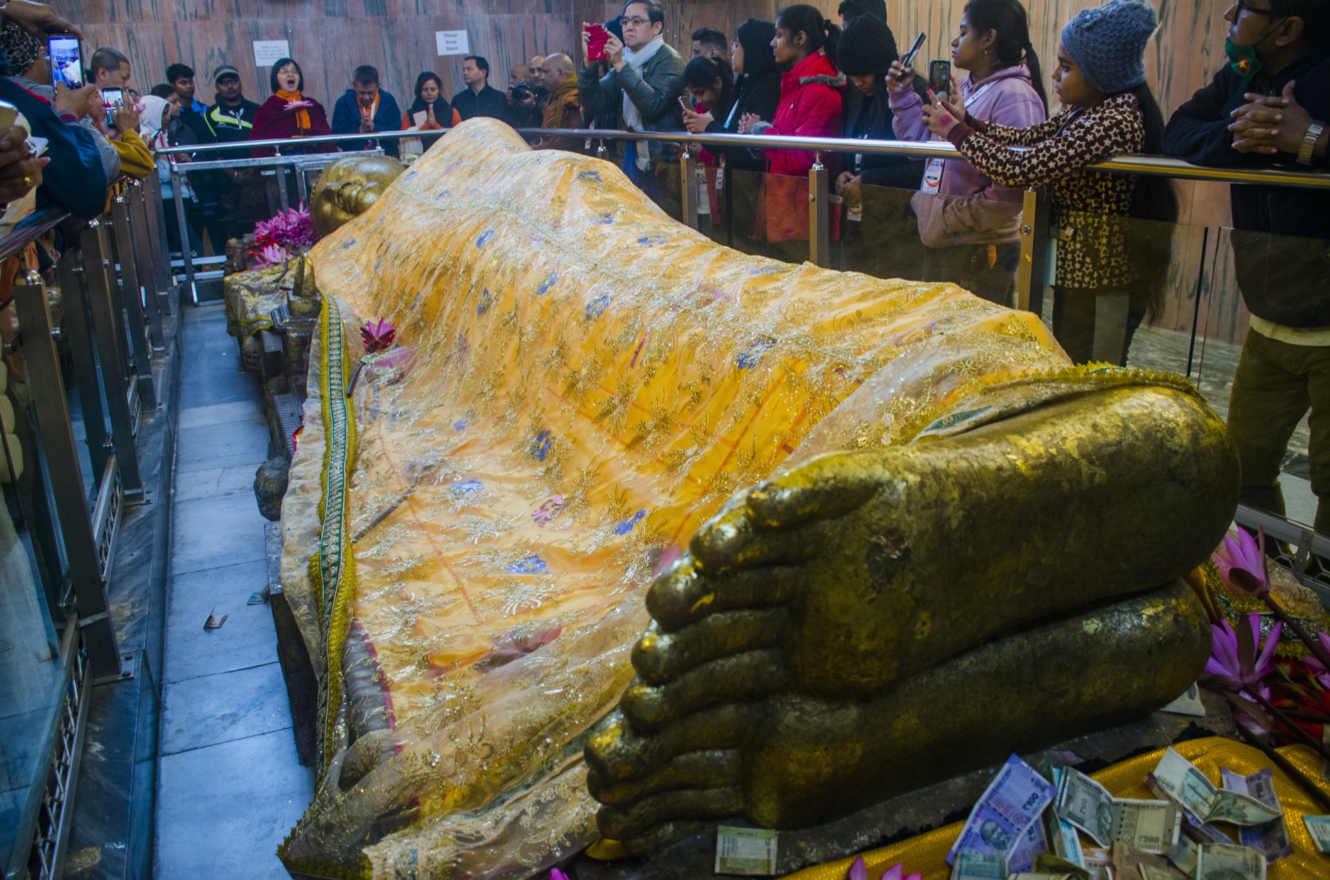 The reclining Parinirvana statue draped in a golden robe
