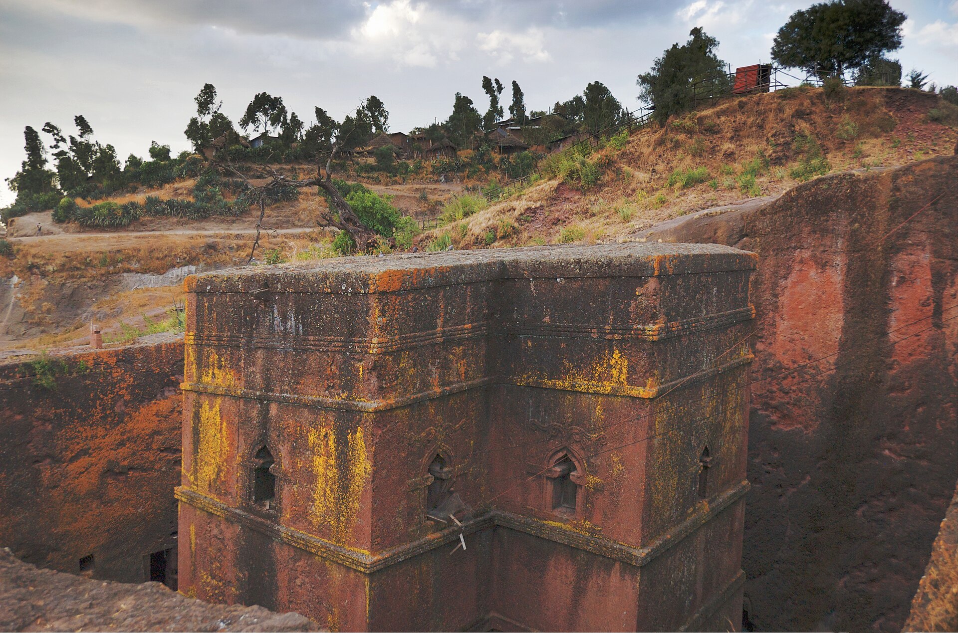 A church carved down into the rock in the shape of a cross