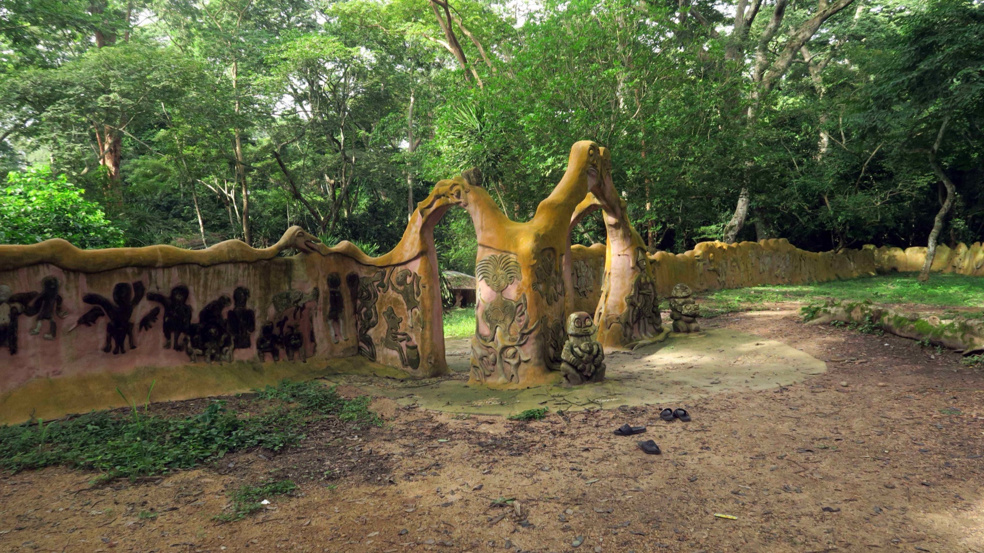 The organic sculpted archway and relief wall of deities in the Osun-Osogbo grove