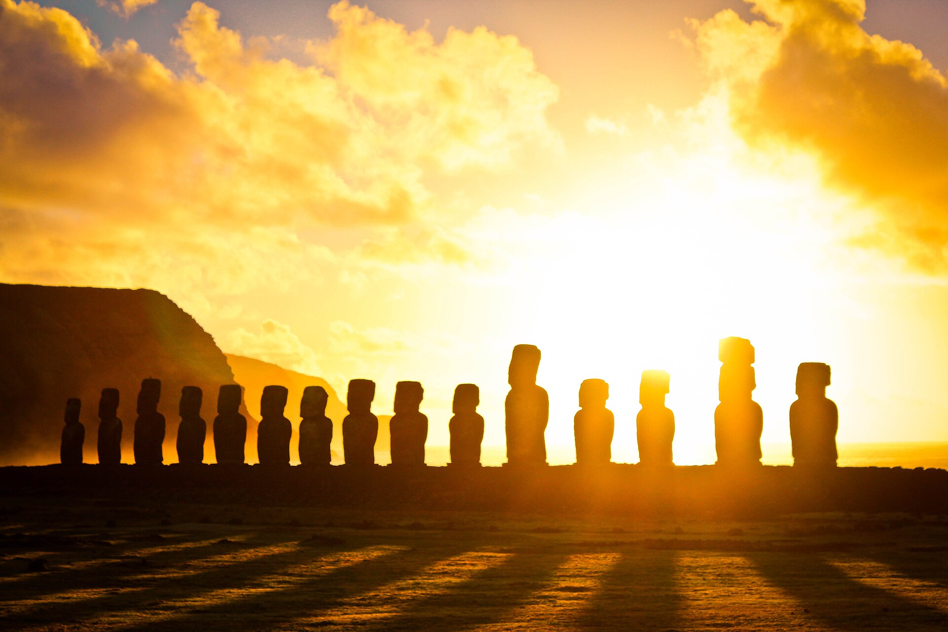 The moai of Tongariki silhouetted against the rising sun