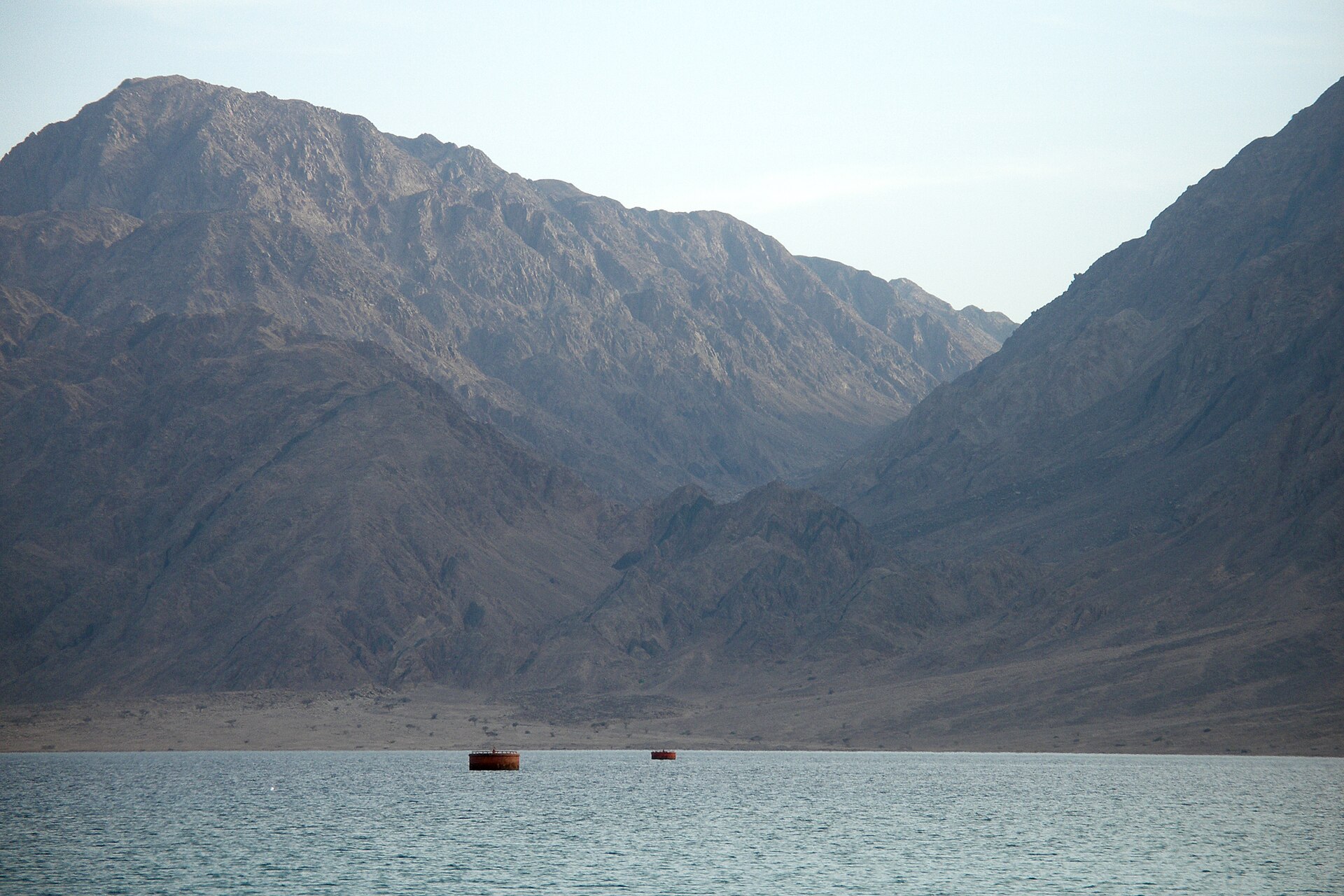 The Sinai coast where red rock mountains fall to a turquoise sea