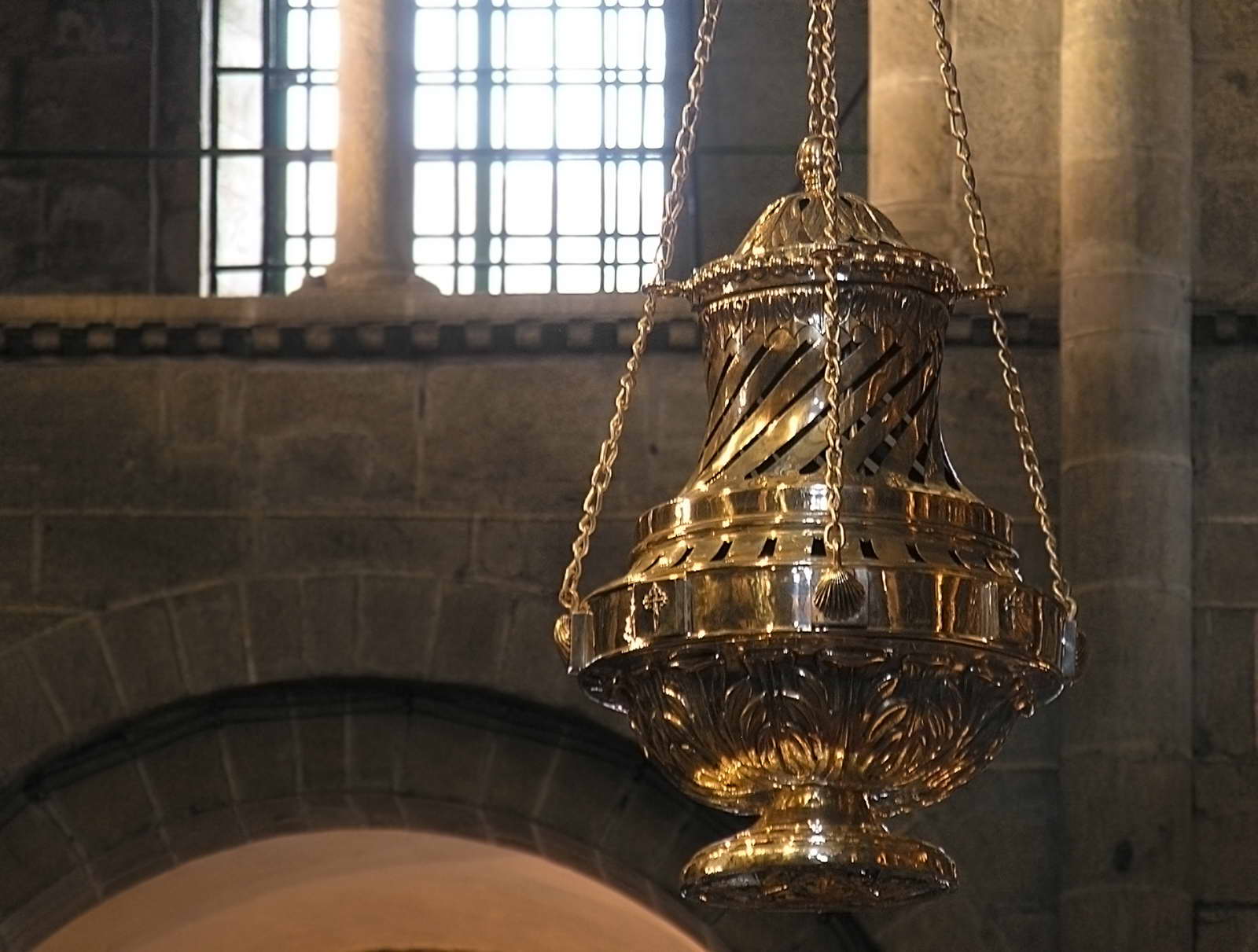 The great golden censer, the Botafumeiro, hanging from its chains