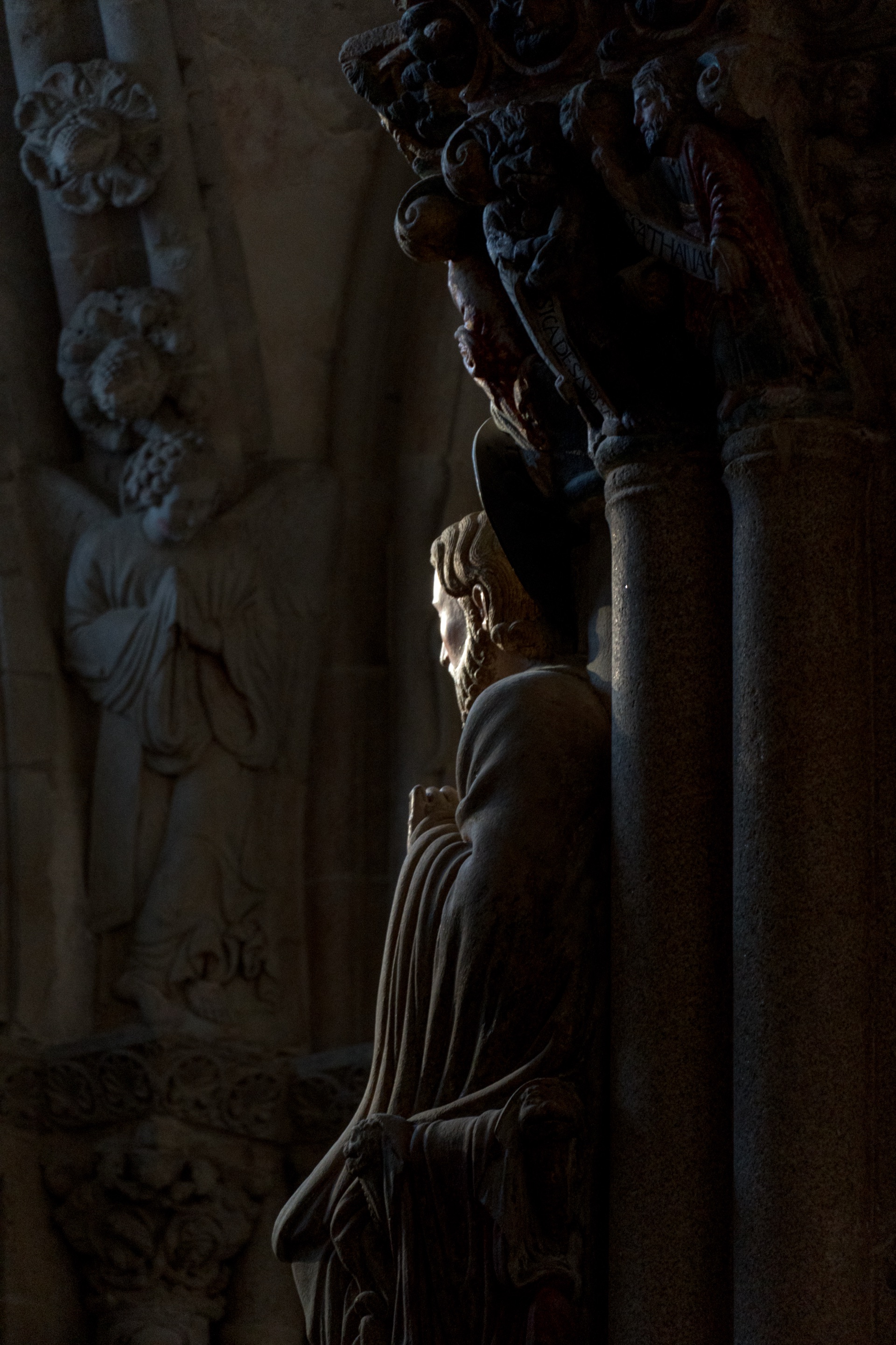 Light falling on the statue of St James in the Pórtico da Gloria