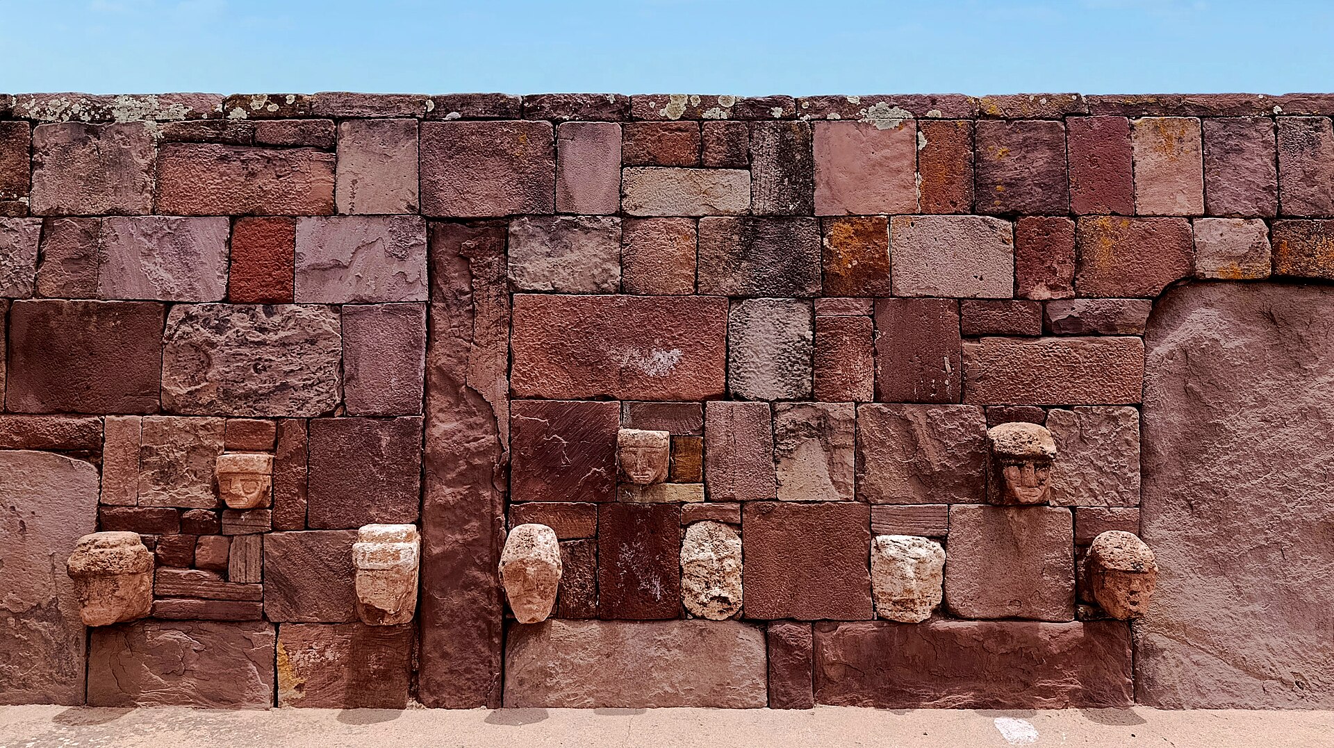 Faces set into the wall of the semi-subterranean temple