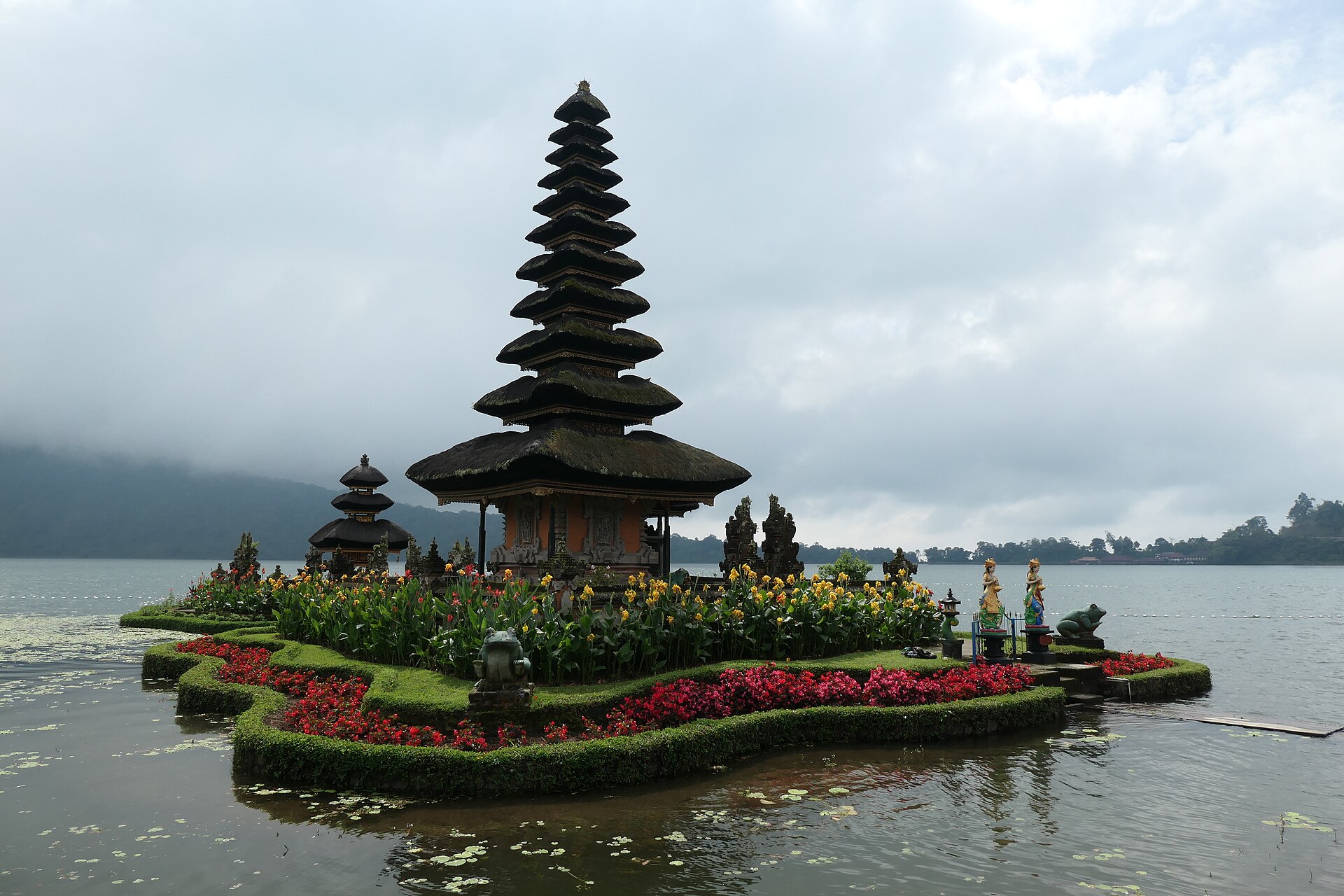 The tiered temple seeming to float on the mist-wrapped lake