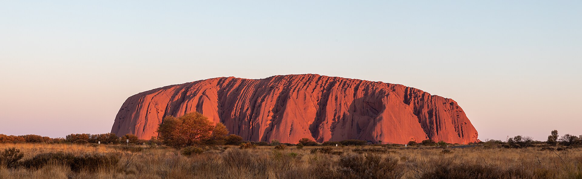 The rock burning red at sunset