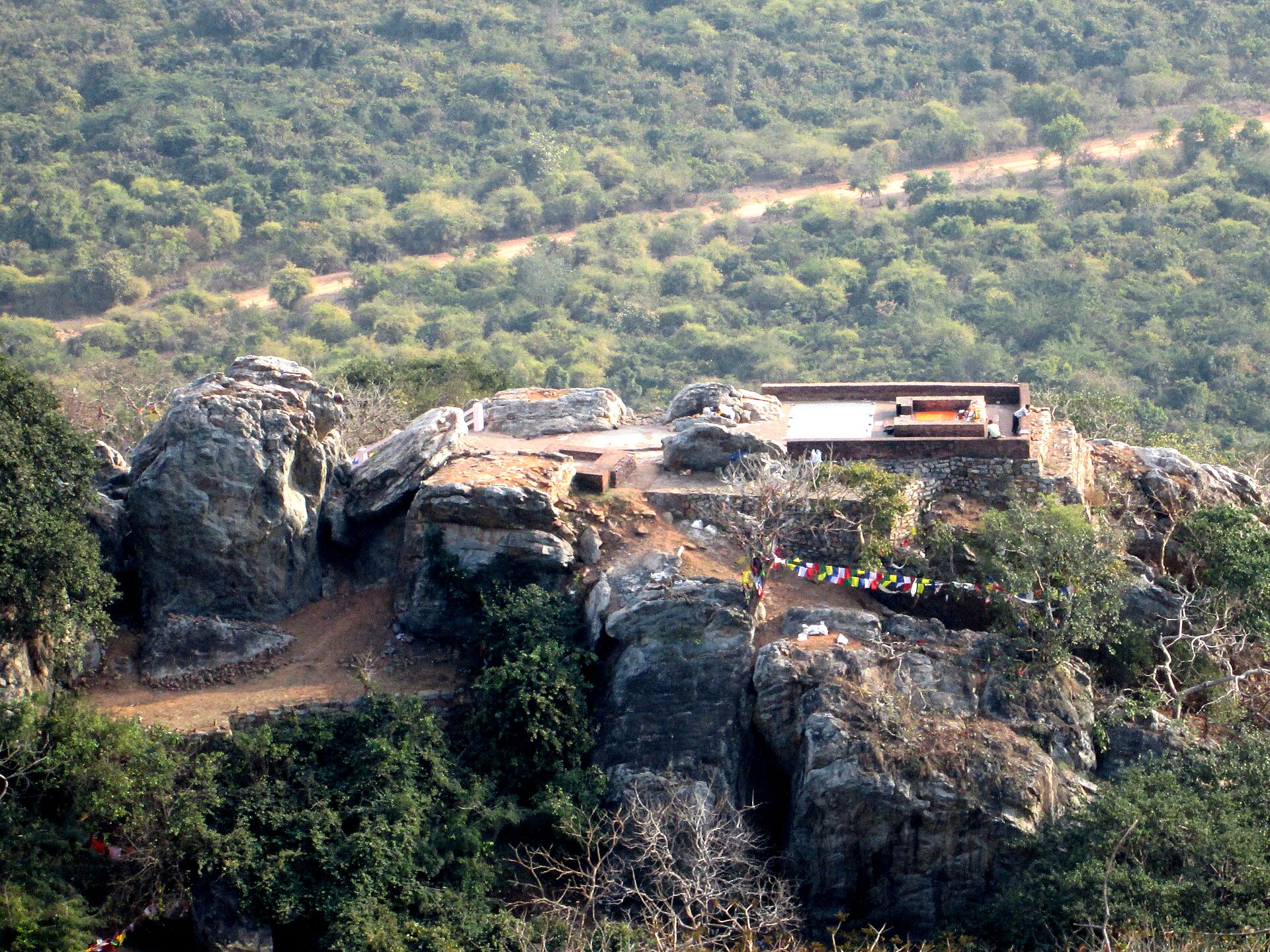 The hilltop teaching site cradled by green hills
